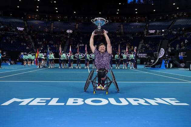 AUSTRALIAN OPEN DAY 13, Dylan Alcott of Australia holds the trophy aloft after winning the men s Quad Wheelchair singles final against Andy Lapthorne of Great Britain on day 13 of the Australian Open tennis tournament at Rod Laver Arena in Melbourne, Saturday, February 1, 2020. ( NO ARCHIVING, EDITORIAL USE ONLY, NO USE IN BOOKS WITHOUT CONSENT MELBOURNE VIC AUSTRALIA  Copyright: xMICHAELxDODGEx 20200201001446064916