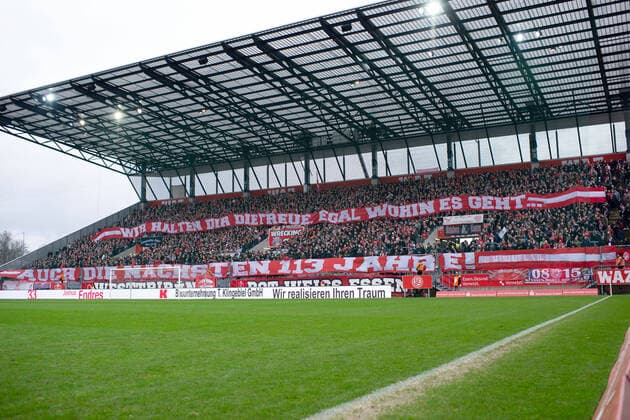 Essen, Germany 01 02 2020 Regionalliga West 2019 2020 Red White Essen vs SV Rödinghausen Fans Essen with choreography for the 113th anniversary of the club Essen Nordrhein Westfalen Germany Stadium at Hafenstraße