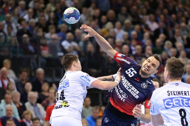 SG Flensburg Handewitt vs SC Magdeburg, LIQUI MOLY Handball Bundesliga, 02 02 2020 Flensburg Michael Damgaard SC Magdeburg, 34 with Michel Jurecki SG Flensburg Handewitt, 55 with Christoph Steinert SC Magdeburg, 08 Copyright: xBEAUTIFULxSPORTS MarioxM.xKobergx