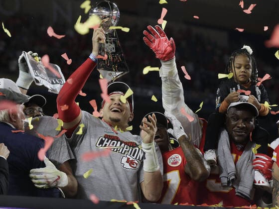 Kansas City Chiefs quarterback and Super Bowl LIV MVP Patrick Mahomes holds the Vince Lombardi trophy at the Hard Rock Stadium in Miami Gardens on Sunday, February 2, 2020. Kansas City defeats San Francisco 31-20 to win Super Bowl LIV.  SBP20200202349 JOHNxANGELILLO