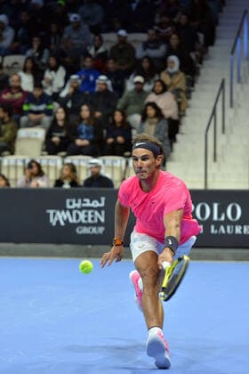 (200206) -- KUWAIT, Feb. 6, 2020 -- Rafael Nadal hits a return during an exhibition match between Rafael Nadal and David Ferrer at the opening ceremony of Rafa Nadal Academy in Hawalli Governorate, Kuwait, on Feb. 5, 2020. (Photo by Asad Xinhua) (SP)KUWAIT-HAWALLI GOVERNORATE-RAFA NADAL ACADEMY-OPENING NiexYunpeng 