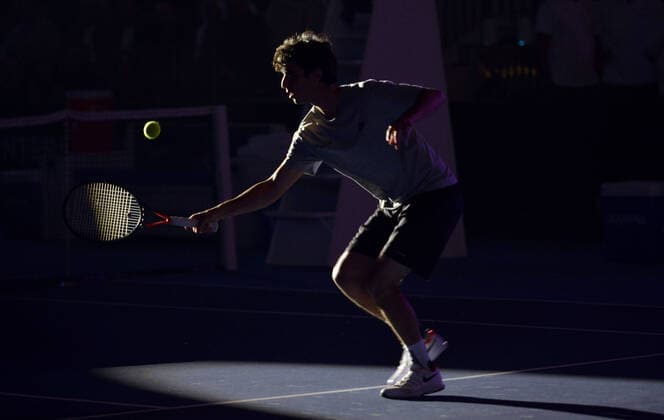 (200206) -- KUWAIT, Feb. 6, 2020 -- A Kuwaiti tennis player performs at the opening ceremony of Rafa Nadal Academy in Hawalli Governorate, Kuwait, on Feb. 5, 2020. (Photo by Asad Xinhua) (SP)KUWAIT-HAWALLI GOVERNORATE-RAFA NADAL ACADEMY-OPENING NiexYunpeng 