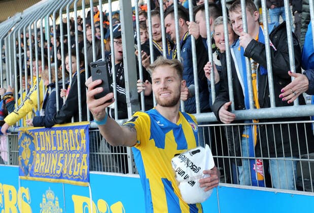 Felix Burmeister Eintracht Braunschweig Selfie with the fans DFL REGULATIONS PROHIBIT ANY USE OF PHOTOGRAPHS AS IMAGE SEQUENCES AND OR QUASI VIDEO