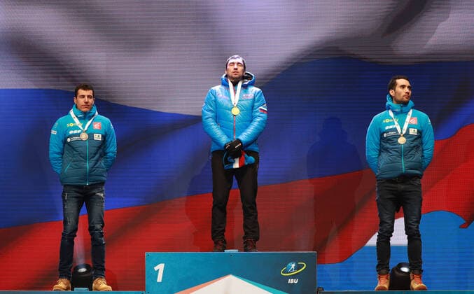 BIATHLON - IBU World Championships Antholz 2020 ANTHOLZ,ITALY,15.FEB.20 - BIATHLON - IBU World Championships 2020, 10km sprint men. Image shows Quentin Fillon Maillet (FRA), Alexander Loginov (RUS) and Martin Fourcade (FRA). Keywords: medal. GEPAxpictures xAndreasxPranter