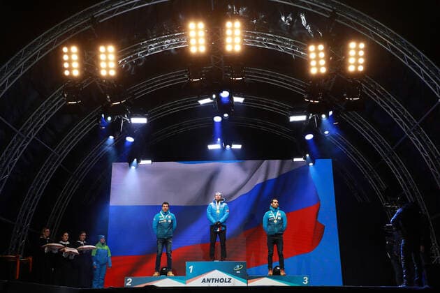 BIATHLON - IBU World Championships Antholz 2020 ANTHOLZ,ITALY,15.FEB.20 - BIATHLON - IBU World Championships 2020, 10km sprint men. Image shows Quentin Fillon Maillet (FRA), Alexander Loginov (RUS) and Martin Fourcade (FRA). Keywords: medal. GEPAxpictures xAndreasxPranter