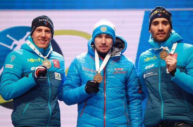 BIATHLON - IBU World Championships Antholz 2020 ANTHOLZ,ITALY,15.FEB.20 - BIATHLON - IBU World Championships 2020, 10km sprint men. Image shows Quentin Fillon Maillet (FRA), Alexander Loginov (RUS) and Martin Fourcade (FRA). Keywords: medal. GEPAxpictures xAndreasxPranter