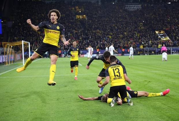 18 02 2020, Football UEFA Champions League 2019 2020, Round of 16, Borussia Dortmund Paris St Germain, in Signal Iduna Park Dortmund Goal celebration Erling Haaland on the ground, Dortmund with Raphael Guerreiro Dortmund li Axel Witsel Dortmund DFL and DFB regulations prohibit any use of photographs as image sequences and or quasi video