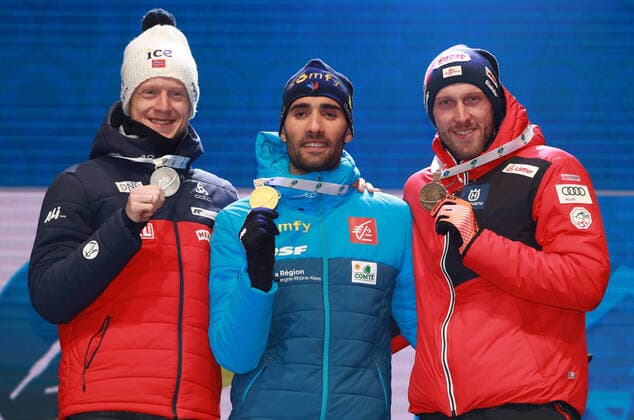BIATHLON - IBU World Championships Antholz 2020 ANTHOLZ,ITALY,19.FEB.20 - BIATHLON - IBU World Championships 2020, 20km individual, men. Image shows Johannes Thingnes Boe (NOR), Martin Fourcade (FRA) and Dominik Landertinger (AUT). Keywords: medal. GEPAxpictures xAndreasxPranter