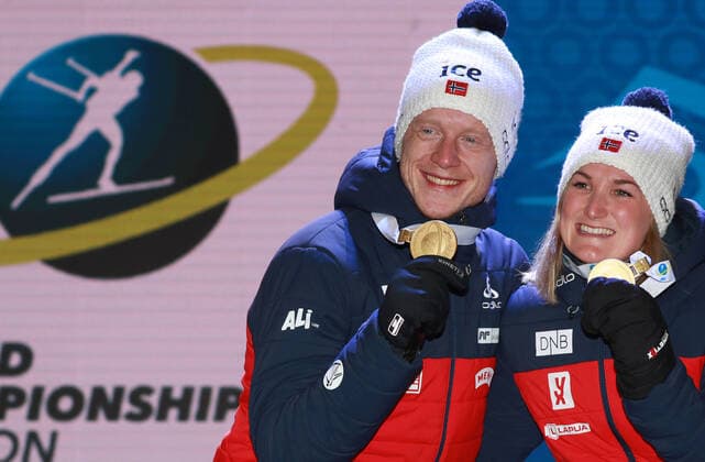BIATHLON - IBU World Championships Antholz 2020 ANTHOLZ,ITALY,20.FEB.20 - BIATHLON - IBU World Championships 2020, single mixed relay. Image shows Johannes Thingnes Boe, Marte Olsbu Roeiseland (NOR). Keywords: medal. GEPAxpictures xAndreasxPranter