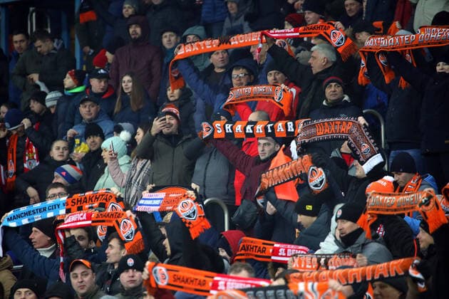 KHARKIV, UKRAINE - FEBRUARY 20, 2020 - Fans of FC Shakhtar Donetsk cheer on their team during the UEFA Europa League Round of 32 1st leg match against S.L. Benfica at the Metalist Stadium Regional Sports Complex, Kharkiv, northeastern Ukraine. UEFA Europa League Round of 32: Shakhtar v. Benfica  Copyright: xVyacheslavxMadiyevskyyx