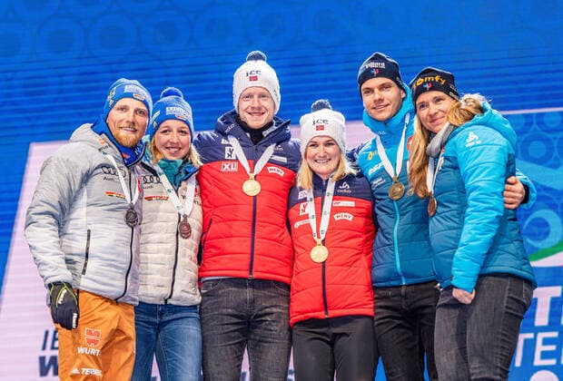 20 02 2020, Suedtirol Arena, Antholz, ITA, IBU World Championships Biathlon, Single Mixed Relay, Award Ceremony, in picture from l silver medalist Erik Lesser GER , Franziska Preuss GER World Champion and Gold Medalist Johannes Thingnes Boe NOR , Marte Olsbu Roeiseland NOR , Bronze Medalist Emilien Jacquelin FRA , Anais Bescond FRA f l Silver medalist Erik Lesser Franziska Preuss of Germany World champion and gold medalist Johannes Thingnes Boe Marte Olsbu Roeiseland of Norway Bronze medalist Emilien Jacquelin and Anais Bescond of France during the winner ceremony for the Single mixed relay of IBU Biathlon World Championships 2020 at the Suedtirol Arena in Antholz, Italy on 2020 02 20 Antholz EP_ade