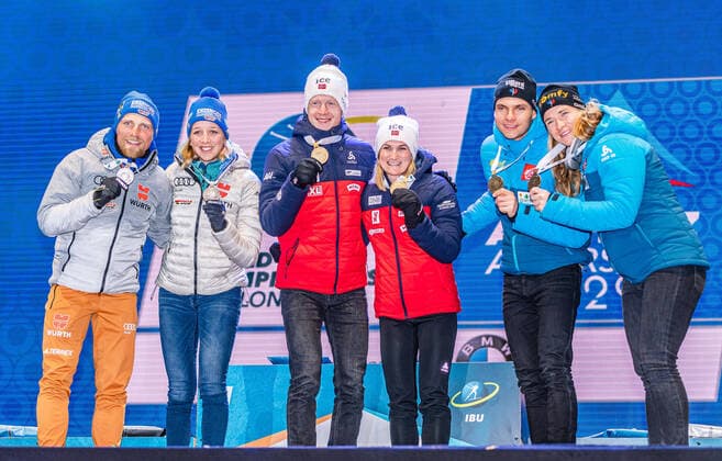20 02 2020, Suedtirol Arena, Antholz, ITA, IBU World Championships Biathlon, Single Mixed Relay, Award Ceremony, in picture from l silver medalist Erik Lesser GER , Franziska Preuss GER World Champion and Gold Medalist Johannes Thingnes Boe NOR , Marte Olsbu Roeiseland NOR , Bronze Medalist Emilien Jacquelin FRA , Anais Bescond FRA f l Silver medalist Erik Lesser Franziska Preuss of Germany World champion and gold medalist Johannes Thingnes Boe Marte Olsbu Roeiseland of Norway Bronze medalist Emilien Jacquelin and Anais Bescond of France during the winner ceremony for the Single mixed relay of IBU Biathlon World Championships 2020 at the Suedtirol Arena in Antholz, Italy on 2020 02 20 Antholz EP_ade
