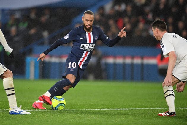 (200224) -- PARIS, Feb. 24, 2020 (Xinhua) -- Neymar (L) of Paris Saint-Germain competes during the Ligue 1 football match between Paris Saint-Germain (PSG) and Bordeaux in Paris, France, Feb. 23, 2020. (Photo by Jack Chan Xinhua) (SP)FRANCE-PARIS-FOOTBALL-LIGUE 1-PSG VS BORDEAUX 