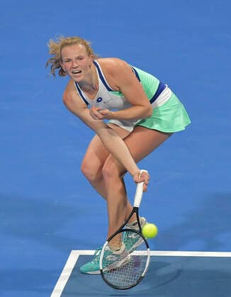 (200224) -- DOHA, Feb. 24, 2020 (Xinhua) -- Katerina Siniakova of the Czech Republic hits a return to Ons Jabeur of Tunisia during their women s singels first round match at 2020 WTA, Tennis Damen Qatar Open tennis tournament in Doha, Qatar, Feb. 23, 2020. (Photo by Nikku Xinhua) (SP)QATAR-DOHA-TENNIS-WTA-SINGLES 