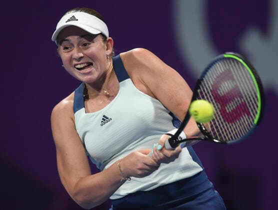 (200224) -- DOHA, Feb. 24, 2020 (Xinhua) -- Jelena Ostapenko of Latvia hits a return to Jil Teichmann of Switzerland during their women s singels first round match at 2020 WTA, Tennis Damen Qatar Open tennis tournament in Doha, Qatar, Feb. 23, 2020. (Photo by Nikku Xinhua) (SP)QATAR-DOHA-TENNIS-WTA-SINGLES 