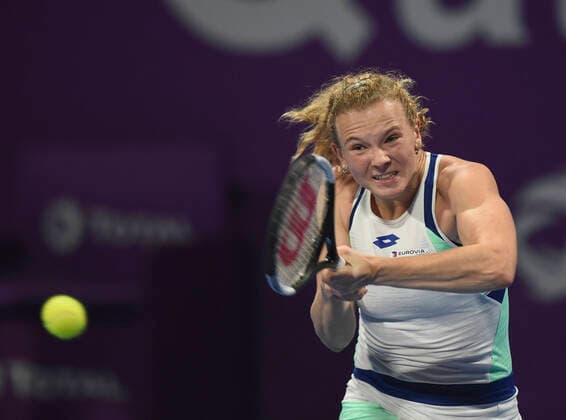 (200224) -- DOHA, Feb. 24, 2020 (Xinhua) -- Katerina Siniakova of the Czech Republic hits a return to Ons Jabeur of Tunisia during their women s singels first round match at 2020 WTA, Tennis Damen Qatar Open tennis tournament in Doha, Qatar, Feb. 23, 2020. (Photo by Nikku Xinhua) (SP)QATAR-DOHA-TENNIS-WTA-SINGLES 