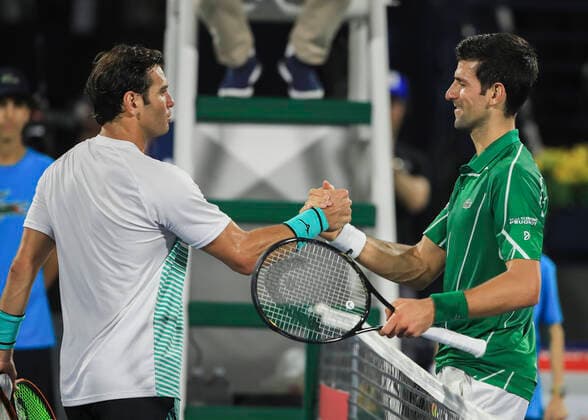 Malek Jaziri congratulates the winner Novak Djokovic SRB Tennis Dubai Duty Free Tennis Championships ATP Dubai Duty Free Tennis Stadium Dubai United Arab Emirates 24 February 2020 Copyright: xJuergenxHasenkopfx