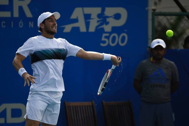(200225) -- ACAPULCO, Feb. 25, 2020 -- Cameron Norrie of Britain hits a return to Adrian Mannarino of France during their men s singles first round match at the 2020 ATP, Tennis Herren Mexican Open tennis tournament in Acapulco, Mexico, Feb. 24, 2020. ) (SP)MEXICO-ACAPULCO-TENNIS-ATP-MEXICAN OPEN-DAY 1 XinxYuewei 