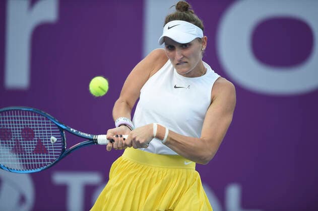 (200225) -- DOHA, Feb. 25, 2020 (Xinhua) -- Marketa Vondrousova of the Czech Republic hits a return during the women s singles second round match against Zheng Saisai of China at the 2020 WTA, Tennis Damen Qatar Open in Doha, Qatar, Feb. 24, 2020. (Photo by Nikku Xinhua) (SP)QATAR-DOHA-TENNIS-WTA-SINGLES 