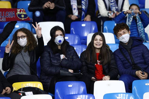 25th February 2020; Stadio San Paolo, Naples, Campania, Italy; UEFA Champions League Football, Napoli versus Barcelona; fans with protective masks for the coronavirus alert  ActionPlus12213909 AlessandroxGarofalo