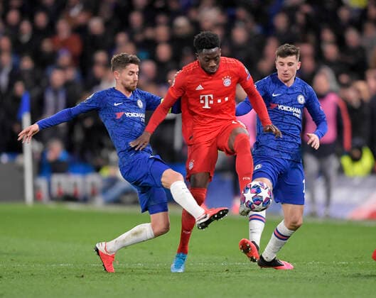 25 02 2020, Football UEFA Champions League 2019 2020, Round of 16, FC Chelsea London FC Bayern Munich, at Stamford Bridge Stadium in London v li Jorginho FC Chelsea London , Alphonso Davies FC Bayern Munich , Mason Mount FC Chelsea London DFL and DFB regulations prohibit any use of photographs as image sequences and or quasi video