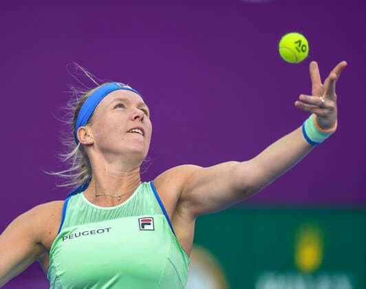 (200227) -- DOHA, Feb. 27, 2020 (Xinhua) -- Kiki Bertens of the Netherlands serves during the women s singles third round match against Zheng Saisai of China at the 2020 WTA, Tennis Damen Qatar Open in Doha, Qatar, Feb. 26, 2020. (Photo by Nikku Xinhua) (SP)QATAR-DOHA-TENNIS-WTA-SINGLES 