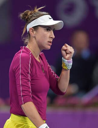 (200227) -- DOHA, Feb. 27, 2020 (Xinhua) -- Belinda Bencic of Switzerland celebrates scoring during the women s singles third round match against Yulia Putintseva of Kazakhstan at the 2020 WTA, Tennis Damen Qatar Open in Doha, Qatar, Feb. 26, 2020. (Photo by Nikku Xinhua) (SP)QATAR-DOHA-TENNIS-WTA-SINGLES 