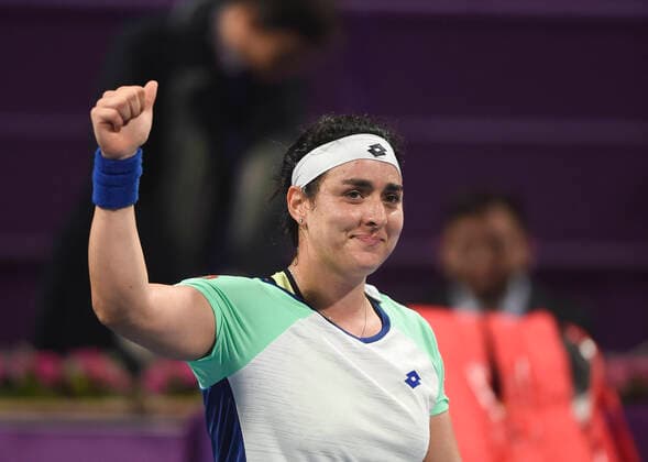 (200227) -- DOHA, Feb. 27, 2020 (Xinhua) -- Ons Jabeur of Tunisia celebrates after winning the women s singles third round match against Karolina Pliskova of Czech Republic at the 2020 WTA, Tennis Damen Qatar Open in Doha, Qatar, Feb. 26, 2020. (Photo by Nikku Xinhua) (SP)QATAR-DOHA-TENNIS-WTA-SINGLES 