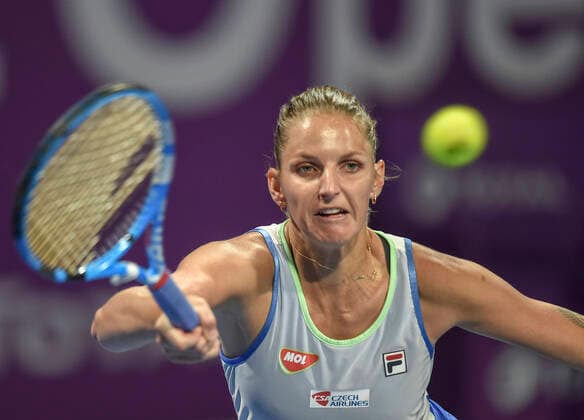 (200227) -- DOHA, Feb. 27, 2020 (Xinhua) -- Karolina Pliskova of Czech Republic hits a return during the women s singles third round match against Ons Jabeur of Tunisia at the 2020 WTA, Tennis Damen Qatar Open in Doha, Qatar, Feb. 26, 2020. (Photo by Nikku Xinhua) (SP)QATAR-DOHA-TENNIS-WTA-SINGLES 