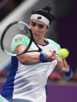 (200227) -- DOHA, Feb. 27, 2020 (Xinhua) -- Ons Jabeur of Tunisia hits a return during the women s singles third round match against Karolina Pliskova of Czech Republic at the 2020 WTA, Tennis Damen Qatar Open in Doha, Qatar, Feb. 26, 2020. (Photo by Nikku Xinhua) (SP)QATAR-DOHA-TENNIS-WTA-SINGLES 