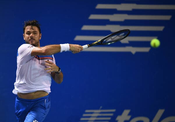 (200227) -- ACAPULCO, Feb. 27, 2020 -- Stan Wawrinka of Switzerland hits a return during the men s singles second round match between Stan Wawrinka of Switzerland and Pedro Martinez of Spain at the 2020 ATP, Tennis Herren Mexican Open tennis tournament in Acapulco, Mexico, Feb. 26, 2020. ) (SP)MEXICO-ACAPULCO-TENNIS-ATP-MEXICAN OPEN XinxYuewei 