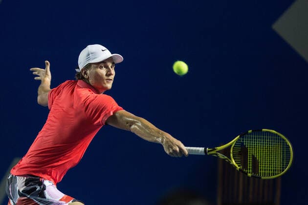 (200227) -- ACAPULCO, Feb. 27, 2020 (Xinhua) -- Miomir Kecmanovic of Serbia hits a return during the men s singles second round match between Rafael Nadal of Spain and Miomir Kecmanovic of Serbia at the 2020 ATP, Tennis Herren Mexican Open tennis tournament in Acapulco, Mexico, Feb. 26, 2020. (Photo by Francisco Canedo Xinhua) (SP)MEXICO-ACAPULCO-TENNIS-ATP-MEXICAN OPEN 