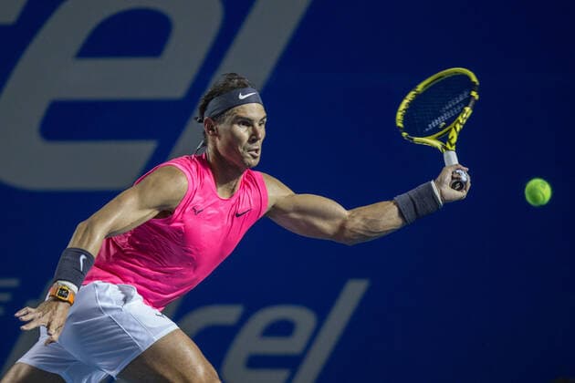 (200227) -- ACAPULCO, Feb. 27, 2020 (Xinhua) -- Rafael Nadal of Spain hits a return during the men s singles second round match between Rafael Nadal of Spain and Miomir Kecmanovic of Serbia at the 2020 ATP, Tennis Herren Mexican Open tennis tournament in Acapulco, Mexico, Feb. 27, 2020. (Photo by Francisco Canedo Xinhua) (SP)MEXICO-ACAPULCO-TENNIS-ATP-MEXICAN OPEN 