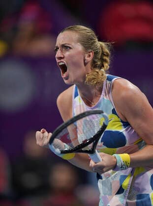 (200228) -- DOHA, Feb. 28, 2020 (Xinhua) -- Petra Kvitova of the Czech Republic celebrates scoring during the women s singles quarterfinal match against Ons Jabeur of Tunisia at the 2020 WTA, Tennis Damen Qatar Open in Doha, Qatar, Feb. 27, 2020. (Photo by Nikku Xinhua) (SP)QATAR-DOHA-TENNIS-WTA-SINGLES 