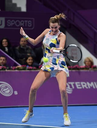 (200228) -- DOHA, Feb. 28, 2020 (Xinhua) -- Petra Kvitova of the Czech Republic hits a return during the women s singles quarterfinal match against Ons Jabeur of Tunisia at the 2020 WTA, Tennis Damen Qatar Open in Doha, Qatar, Feb. 27, 2020. (Photo by Nikku Xinhua) (SP)QATAR-DOHA-TENNIS-WTA-SINGLES 