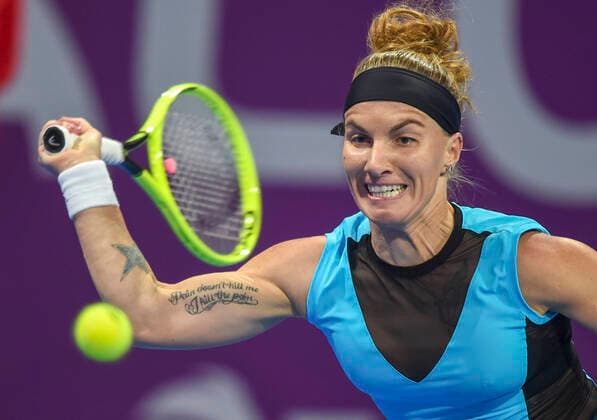 (200229) -- DOHA, Feb. 29, 2020 (Xinhua) -- Svetlana Kuznetsova of Russia hits a return during the women s singles semi-final match against Aryna Sabalenka of Belarus at the 2020 WTA, Tennis Damen Qatar Open in Doha, Qatar, Feb. 28, 2020. (Photo by Nikku Xinhua) (SP)QATAR-DOHA-TENNIS-WTA-SINGLES 