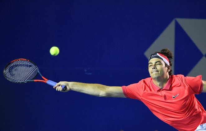 (200229) -- ACAPULCO, Feb. 29, 2020 -- Taylor Fritz hits a return during the men s singles semifinal match between Taylor Fritz of the United States and John Isner of the United States at the 2020 ATP, Tennis Herren Mexican Open tennis tournament in Acapulco, Mexico, Feb. 28, 2020. ) (SP)MEXICO-ACAPULCO-TENNIS-ATP-MEXICAN OPEN-SEMIFINALS XinxYuewei 