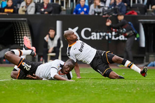 29th February 2020; Mestalla, Valencia, Spain; La Liga Football,Valencia versus Real Betis; Mouctar Diakhaby of Valencia CF and Geoffrey Kondogbia of Valencia CF misses to get his show away on goal  ActionPlus12214781 IvanxArlandis