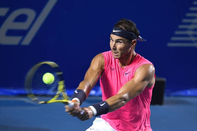 (200301) -- ACAPULCO, March 1, 2020 -- Rafael Nadal of Spain hits a return during the men s singles final match between Rafael Nadal of Spain and Taylor Fritz of the United States at the 2020 ATP, Tennis Herren Mexican Open tennis tournament in Acapulco, Mexico, Feb. 29, 2020. ) (SP)MEXICO-ACAPULCO-TENNIS-ATP-MEXICAN OPEN-FINALS XinxYuewei 