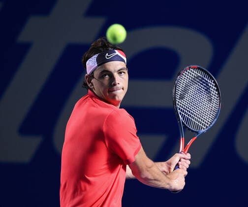(200301) -- ACAPULCO, March 1, 2020 -- Taylor Fritz of the United States hits a return during the men s singles final match between Rafael Nadal of Spain and Taylor Fritz of the United States at the 2020 ATP, Tennis Herren Mexican Open tennis tournament in Acapulco, Mexico, Feb. 29, 2020. ) (SP)MEXICO-ACAPULCO-TENNIS-ATP-MEXICAN OPEN-FINALS XinxYuewei 