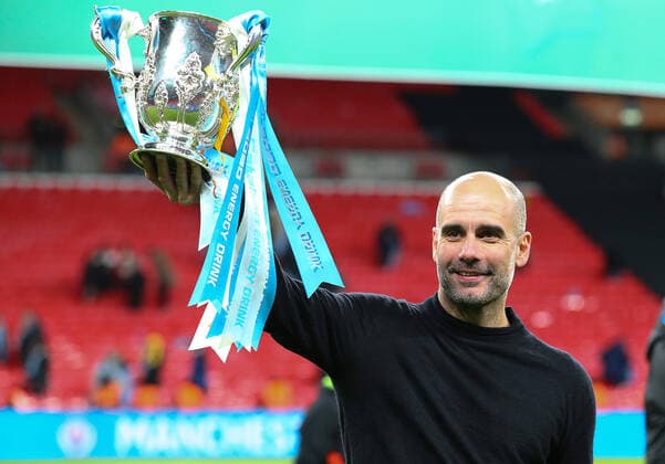 Bilder des Jahres 2020, Sport 03 März Sport Themen der Woche KW09 Sport Bilder des Tages Manchester CityÕs head coach Pep Guardiola celebrates with the trophy after his team win the Carabao Cup match at Wembley Stadium, London. Picture date: 1st March 2020. Picture credit should read: Paul Terry Sportimage EDITORIAL USE ONLY. No use with unauthorised audio, video, data, fixture lists, club league logos or live services. Online in-match use limited to 120 images, no video emulation. No use in betting, games or single club league player publications. SPI-0522-0022