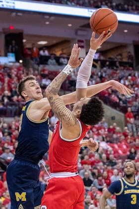 March 1, 2020, Columbus, Ohio, U.S: Michigan Wolverines guard Franz Wagner (21) blocks a shot attempt by Ohio State Buckeyes guard Duane Washington Jr. (4) in the game between the Michigan Wolverines and the Ohio State Buckeyes at the Value City Arena, Columbus, Ohio. NCAA, College League, USA Basketball 2020 - Michigan vs Ohio State - ZUMAs304 20200301_zaf_s304_024 Copyright: xScottxStuartx