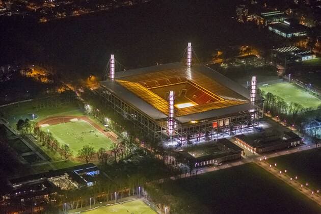 Nachtaufnahme des RheinEnergieStadions (Muengersdorfer Stadion) im Stadtteil Muengersdorf, Fussballstadion des 1. FC Koeln, 26.03.2013, Luftbild, Deutschland, Nordrhein-Westfalen, Koeln Night view of RheinEnergieStadium in the district Muengersdorf of 1. FC Koeln, 26.03.2013, aerial view, Germany, North Rhine-Westphalia, Cologne BLWS607667.jpg