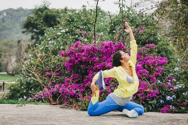 Fit female personal trainer exercising, stretching in park , Portugal Lisbon Lisbon  Copyright: AlexandraxC.xRibeiro fStopImages1867026