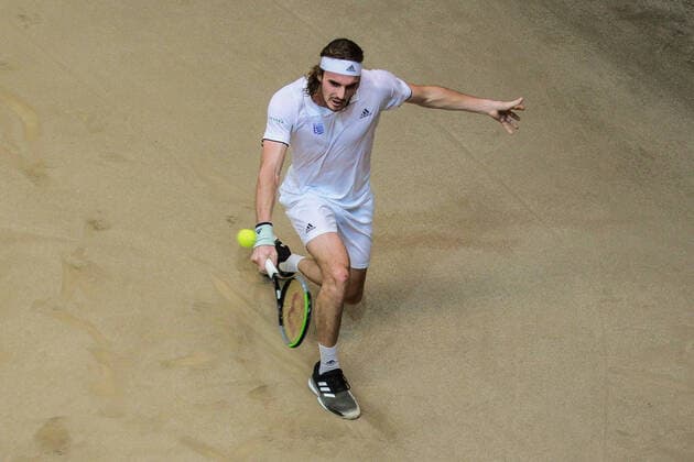 (200306) -- MANILA, March 6, 2020 -- Stefanos Tsitsipas of Greece returns the ball during the singles match against Alberto Lim of the Philippines at Davis Cup World Group II play-off round between the Philippines and Greece in Manila, the Philippines on March 6, 2020. ) (SP)PHILIPPINES-MANILA-TENNIS-DAVIS CUP-GREECE VS PHILIPPINES ROUELLExUMALI 
