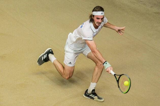 (200306) -- MANILA, March 6, 2020 -- Stefanos Tsitsipas of Greece returns the ball during the singles match against Alberto Lim of the Philippines at Davis Cup World Group II play-off round between the Philippines and Greece in Manila, the Philippines on March 6, 2020. ) (SP)PHILIPPINES-MANILA-TENNIS-DAVIS CUP-GREECE VS PHILIPPINES ROUELLExUMALI 