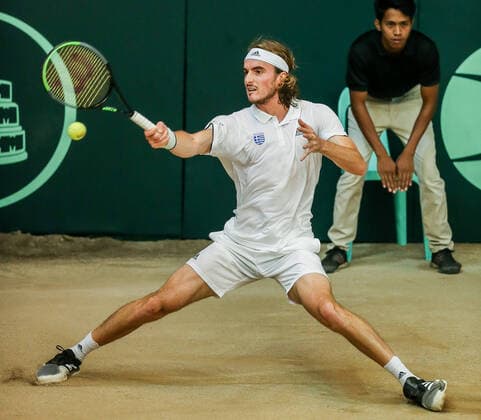 (200306) -- MANILA, March 6, 2020 -- Stefanos Tsitsipas of Greece returns the ball during the singles match against Alberto Lim of the Philippines at Davis Cup World Group II play-off round between the Philippines and Greece in Manila, the Philippines on March 6, 2020. ) (SP)PHILIPPINES-MANILA-TENNIS-DAVIS CUP-GREECE VS PHILIPPINES ROUELLExUMALI 