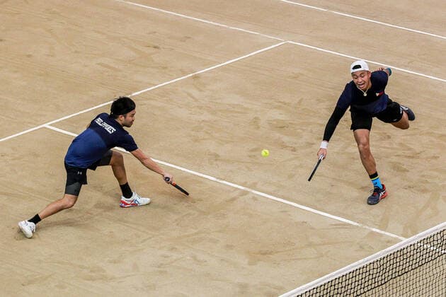 (200307) -- MANILA, March 7, 2020 -- Francis Casey Alcantara and Ruben Gonzalez (L) of the Philippines compete against Markos Kalovelonis and Petros Tsitsipas of Greece during the Davis Cup World Group II Play-Offs First Round doubles match between the Philippines and Greece in Manila, the Philippines on March 7, 2020. ) (SP)PHILIPPINES-MANILA-TENNIS-DAVIS CUP-GREECE VS PHILIPPINES ROUELLExUMALI 