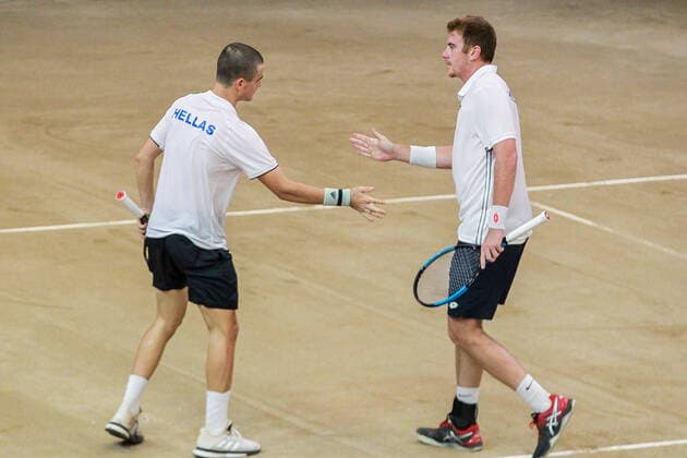 (200307) -- MANILA, March 7, 2020 -- Markos Kalovelonis (R) and Petros Tsitsipas of Greece react against Francis Casey Alcantara and Ruben Gonzalez of the Philippines during the Davis Cup World Group II Play-Offs First Round doubles match between the Philippines and Greece in Manila, the Philippines on March 7, 2020. ) (SP)PHILIPPINES-MANILA-TENNIS-DAVIS CUP-GREECE VS PHILIPPINES ROUELLExUMALI 