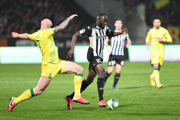 Nicolas Pallois (FC Nantes), Sada THIOUB (Angers SCO) FOOTBALL : Angers SCO vs FC Nantes - Ligue 1 - 07 03 2020 RonanHoussin Panoramic 